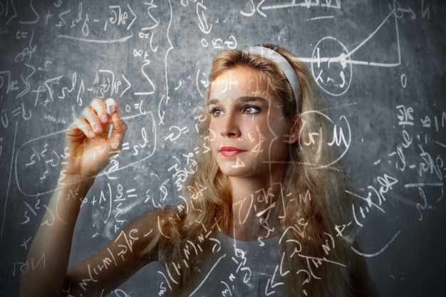 Teen girl calculating 102671