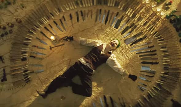 The-JOker-lying-in-a-circle-of-knives-443040