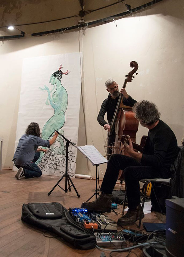 La performance di live painting che ha inaugurato il festival