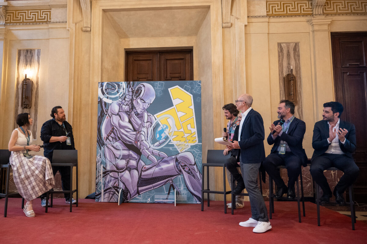 Reveal del key visual ufficiale di mgwcmx 2025